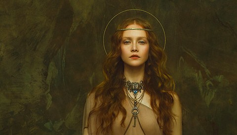 Painting of attractive woman with halo