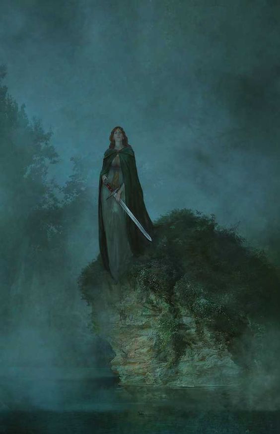 A woman in a cape standing at the water's edge, sword in hand. The background is dark and misty.