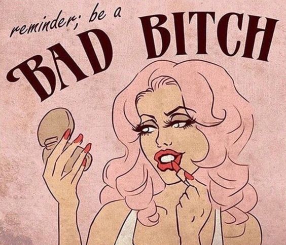 A woman puts on makeup, with the text: Reminder, be a BAD BITCH.